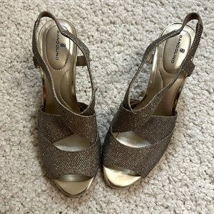 ACCEPTING OFFERS! Brand new, never worn silver Bandolino 2 inch heels; size 7.5